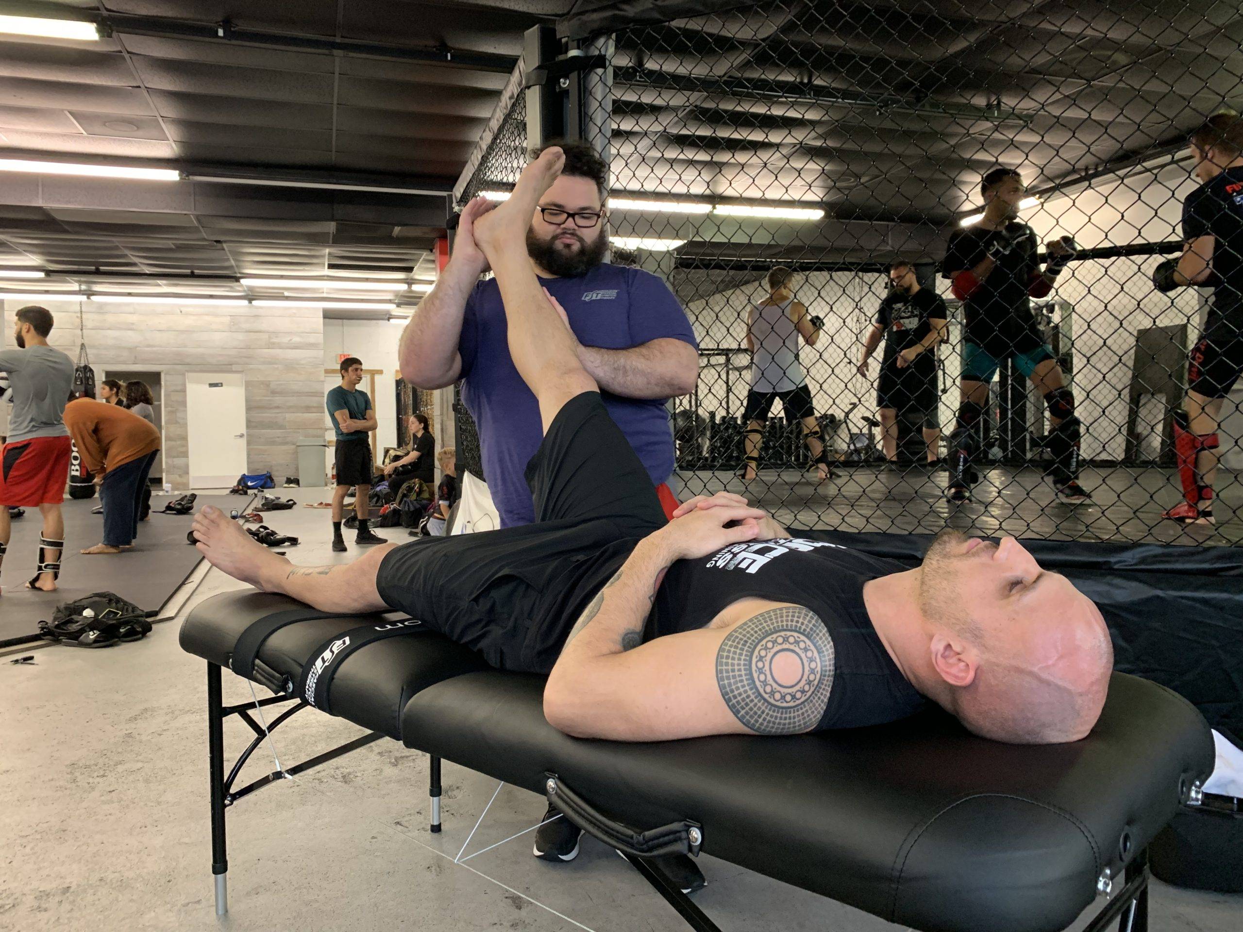 Stretch therapy performed for a professional Jiu-jitsu grappler and mma fighter