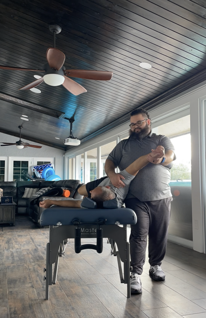 Stretch therapy performed to help alleviate stress for a medical professional. Stretch therapy helps with stress relief and improvement in work performance.